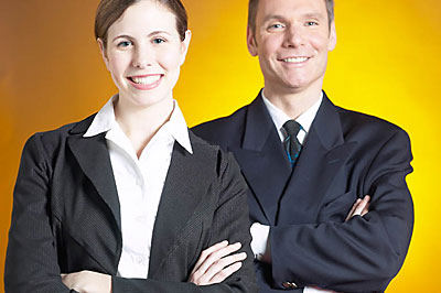 two business people smiling