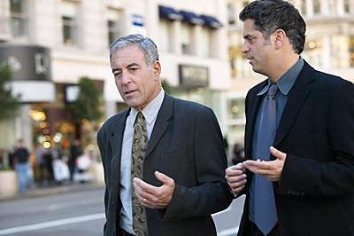 business men walking and talking
