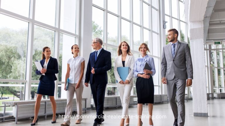 business people walking in foyer