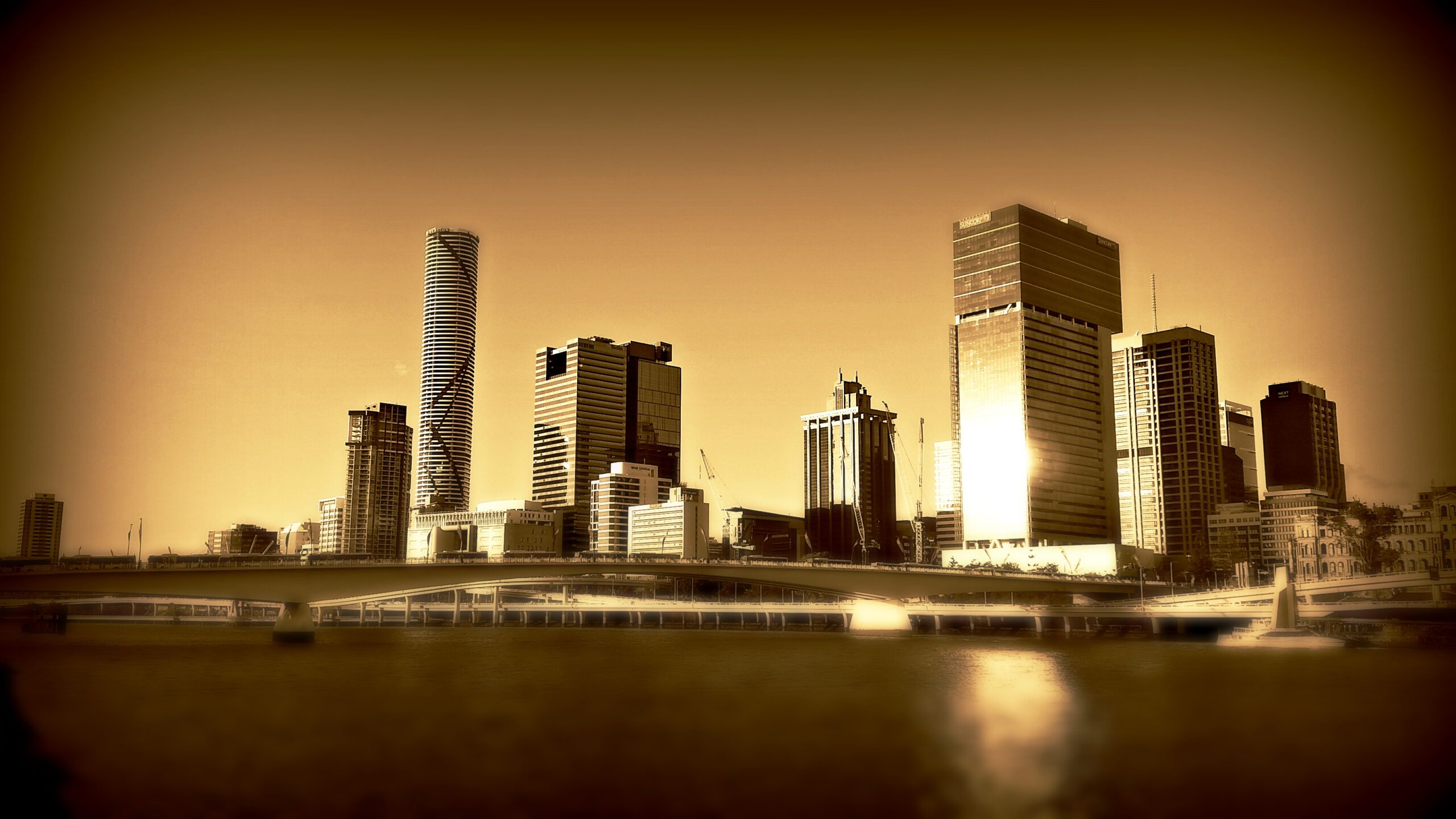 city buildings by river