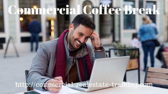 commercial real estate agent at computer