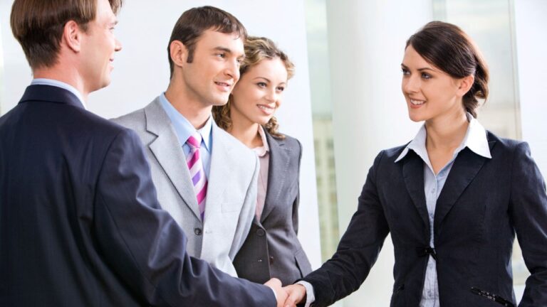 business meeting handshake with woman