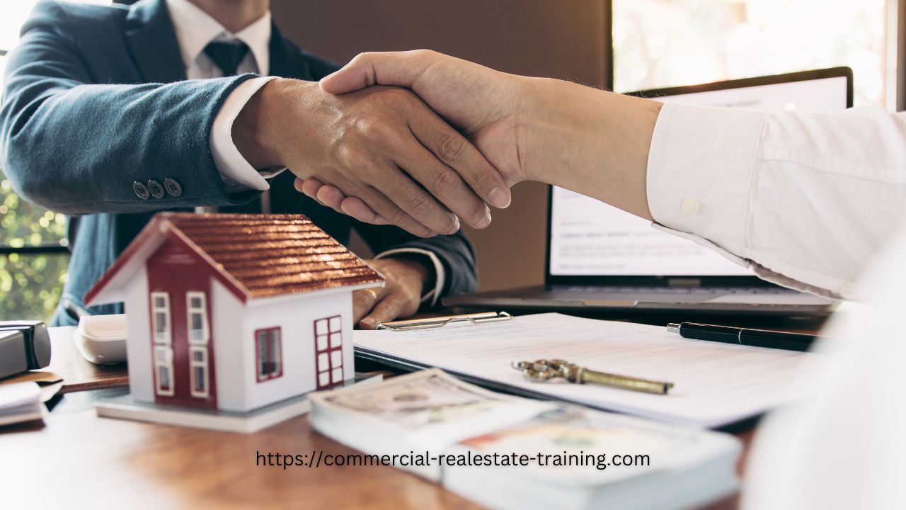 people shaking hands in real estate transaction