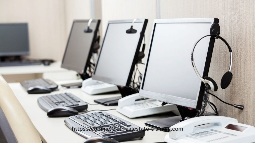 telephone call headsets on computer desk